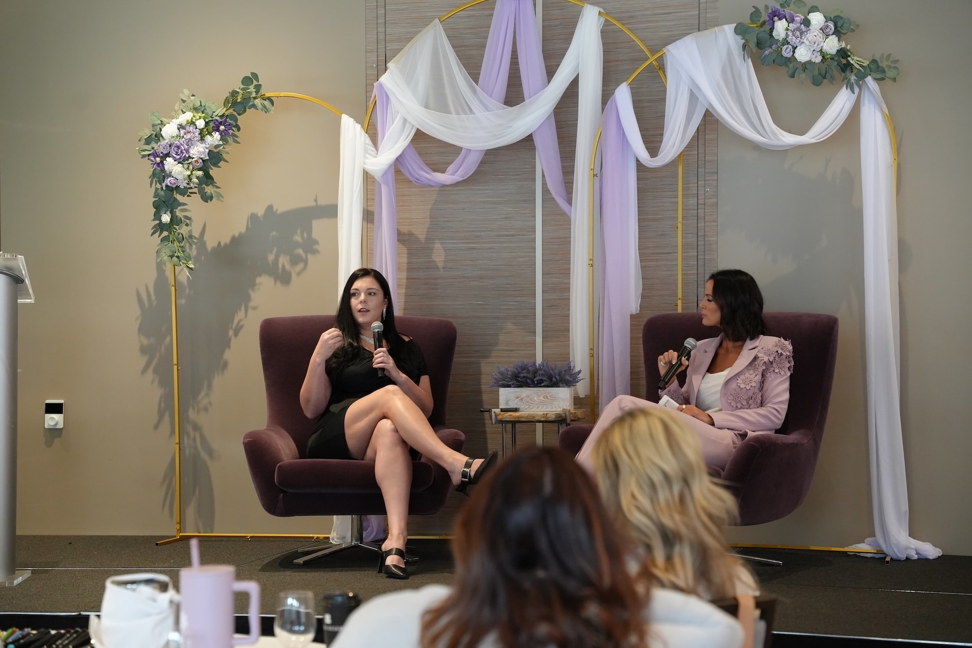 Nikki Boles speaking at the 2025 HER Success Summit — The Power of YET